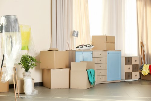 Removal team planning a home move in Acton near residential flats