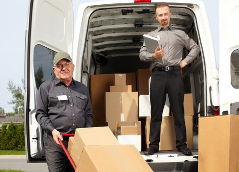 Removal van servicing a move in Acton residential streets