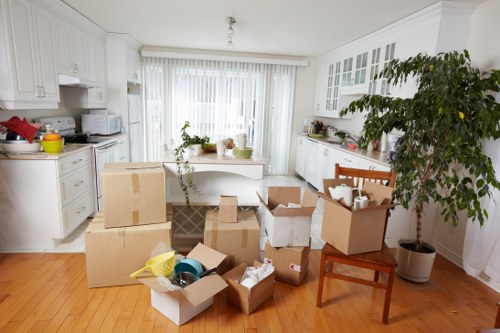 Moving day preparation and unloading during a removal service in Acton