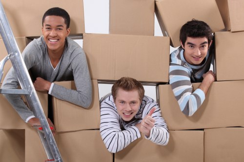 Packed boxes and furniture prepared for storage in Acton