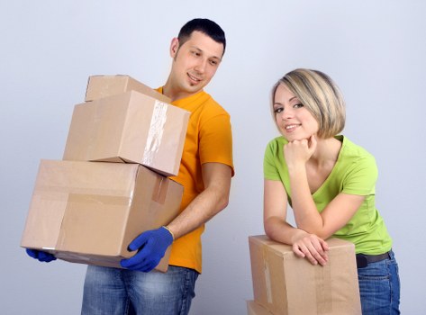 Staff using protective equipment during a removal job