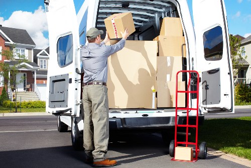 Student move preparation with labelled boxes and furniture in Acton