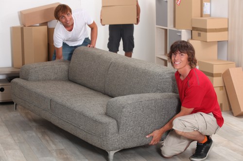 Local Acton man and van team handling furniture and boxes