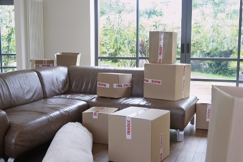 Packed student furniture and boxes ready for local removal in Acton
