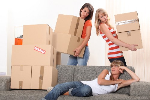 Packed boxes and furniture prepared for removals in Acton